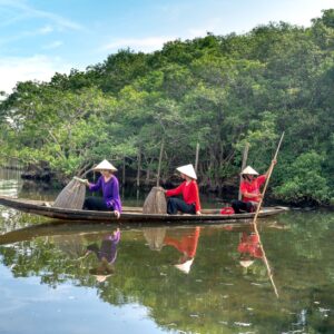 women on a wooden boat