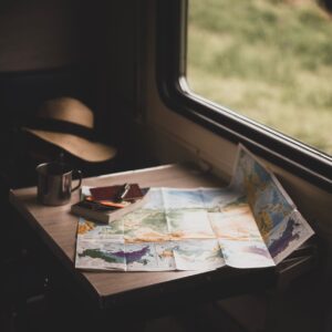 map and book on the table near the window